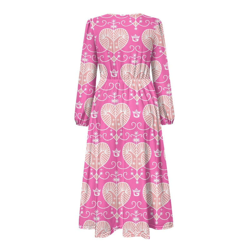 TMMG Haiti Voodoo Ezili Freda Tie Waist Midi Dress blends elegance and culture. With a V-neck and long sleeves, it offers comfort, style, and heritage.